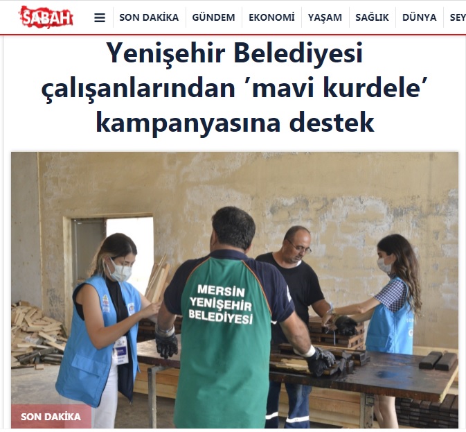 Yenişehir Belediyesi çalışanlarından 'Mavi Kurdele' kampanyasına destek